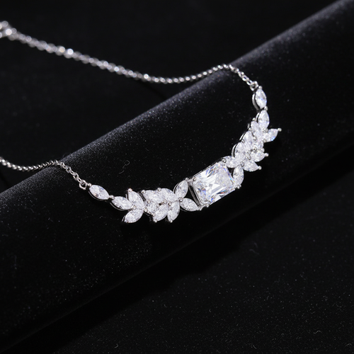 Celeste Bloom moissanite necklace on black velvet display